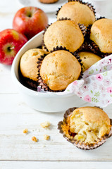 Apple muffins on a white wooden background