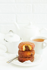 Donuts with cinnamon and chocolate cream. Homemade baking. Selective focus.