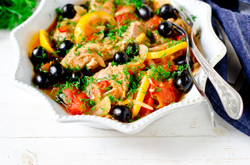 Chicken (turkey) stewed with tomatoes, olives and lemon in Italian style