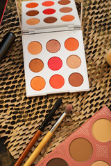 fashion set of new cosmetics palettes with  brushes. close up
