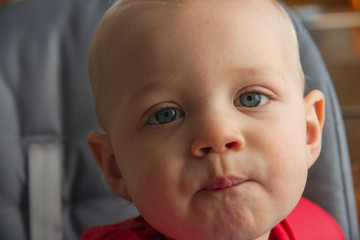 caucasian boy looking at camera