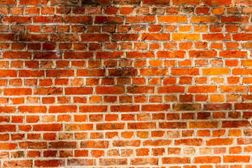 Od red brick wall texture background. bricked wall of orange color, wide vintage style.