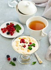 Zabaglione with champagne and berries. French dessert.