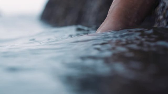 close up hands touching water refreshing stream flowing fresh river splashing sustainability concept