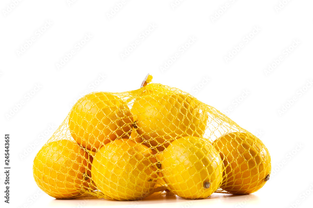 Wall mural lemons in a mesh bag