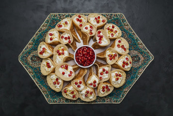 Qatayef Asafiri, Arabian pancake stuffed with sweet cheese.