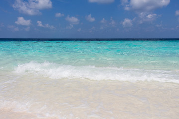 Powder beautiful soft white sandy beach and crystal clear turquoise water, Maldives