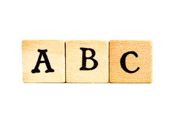 letters abc on wooden cubes