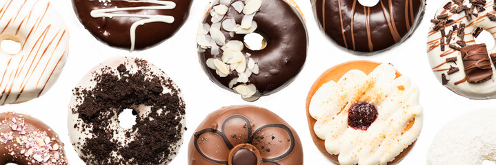 Multiple doughnuts on white background. High resolution image for food industry.