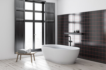 Naklejka na ściany i meble Black tile bathroom corner, white tub