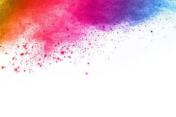 Colorful powder explosion on white background. Colored cloud. Colorful dust explode. Paint Holi.