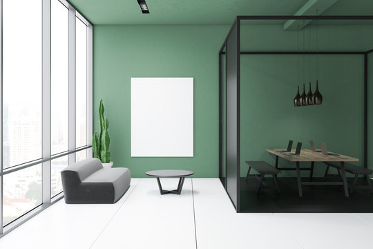 Lounge in green office with poster