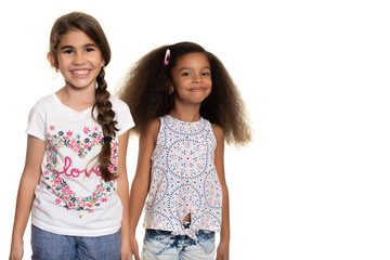 Hispanic and african american small girls  on a white background