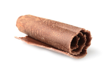 Curl of tasty chocolate on white background