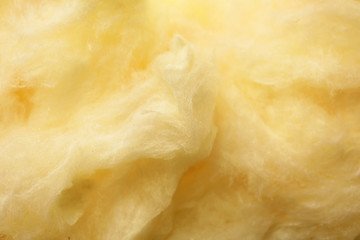 Fluffy yummy cotton candy as background, closeup