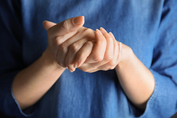 Woman showing word believe, closeup. Sign language