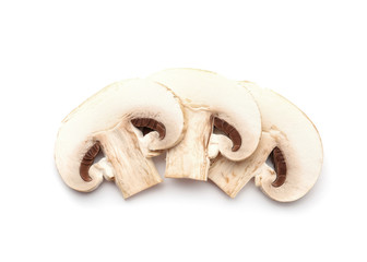 Fototapeta na wymiar Slices of fresh champignon mushrooms on white background, top view