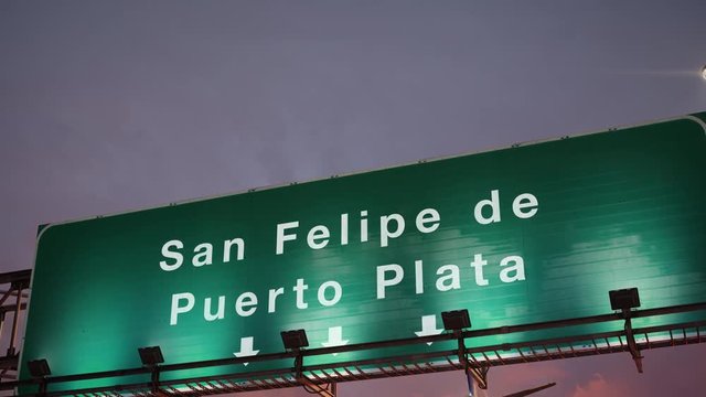 Airplane Landing San Felipe de Puerto Plata during a wonderful sunrise