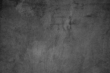 Black concreted wall for interiors texture background..