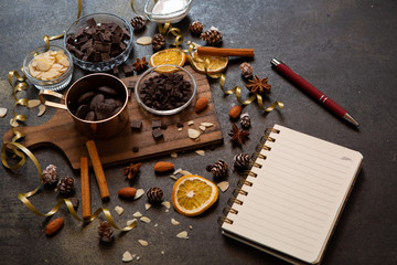 chocolates, ingredients on black table  