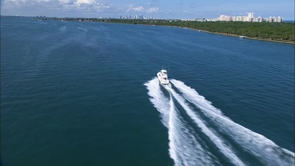Aerial view motor boat with Miami Skyline USA