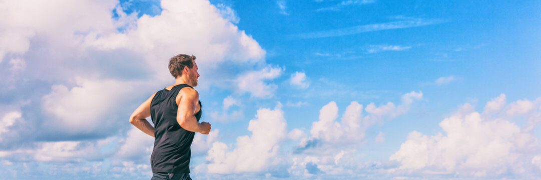 Run Fit Young Man Athlete Runner Jogging Exercise Cardio On Blue Sky Background Banner Panorama. Healthy Active Living.