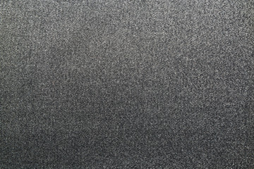 Texture of denim background. Grey jeans