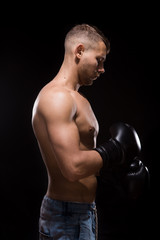 Fototapeta na wymiar MMA Fighter Preparing Bandages For Training.