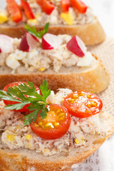 Sandwiches or baguette with mackerel or tuna fish paste, healthy nutrition