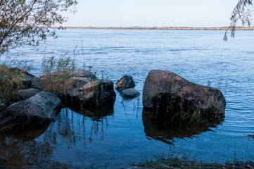 Basalt boulders on bank of  Amur River, below the village of Sikachi-Alyan