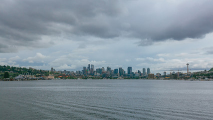 Fototapeta premium Skyline of downtown Seattle over Lake Union under clouds, in Seattle, USA