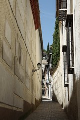 City view of Granada - one of the most beautiful and ancient cities in Spain. Street in Granada