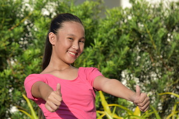 Asian Teen Girl With Thumbs Up