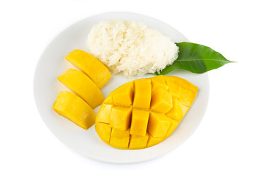 yellow Mango with sticky rice on a white plate Isolated on white background