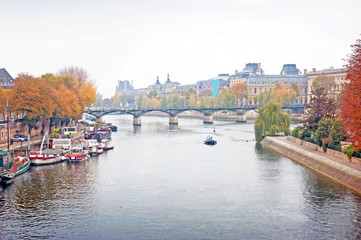 Panorama view of the bridge Pont des Arts and river Seine in Paris, France in the winter season.
