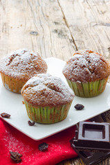 Muffins on a wooden table