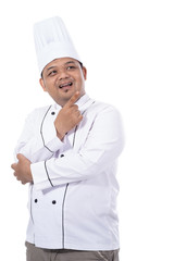 portrait of young male chef standing confident pose look at a front of the camera