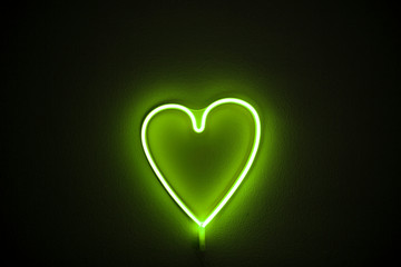 Green neon light. Love concept. Space for you text.