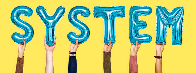 Blue alphabet helium balloons forming the text system