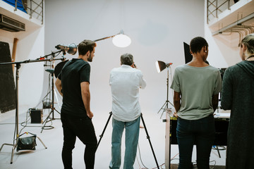 Artist in the studio with lighting equipment