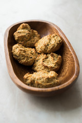 Homemade Salty Yogurt Cookies with Rolled Oats / Salted Pastries in Wooden Bowl.