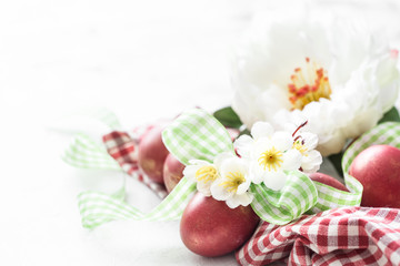 Easter background with red egg with flowers
