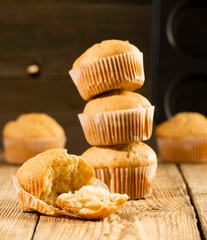 Vanilla cupcake, homemade cakes on wooden background