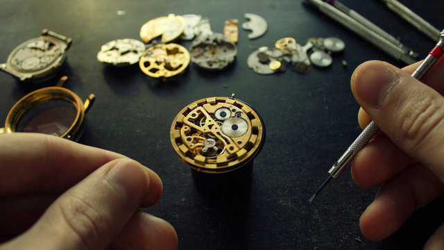 Mechanical watch repair, dismanted watch, close up