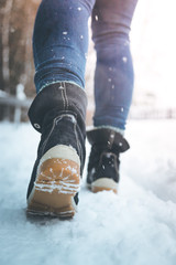 Girl is walking on snow, wintertime, cutout