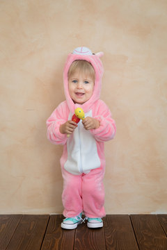 Funny kid wearing Easter bunny