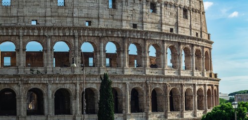 Obraz premium panoramic view on Colloseum and blye sky, Rome, Italy
