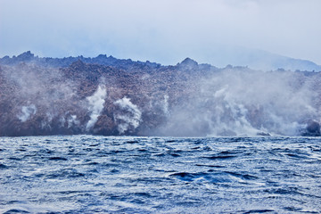 Fototapeta premium Hot Volcanic Lava Ffalls Into Sea.