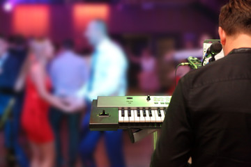 Dancing couples during party event or wedding celebration