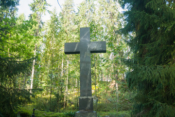 Cross at old beautiful semetery in Finland.